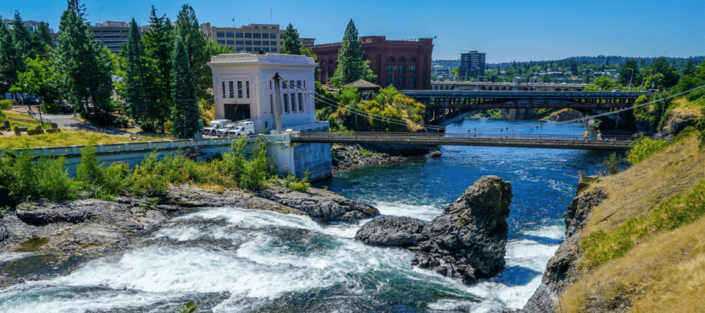 river in Spokane, Washington going underneath bridges