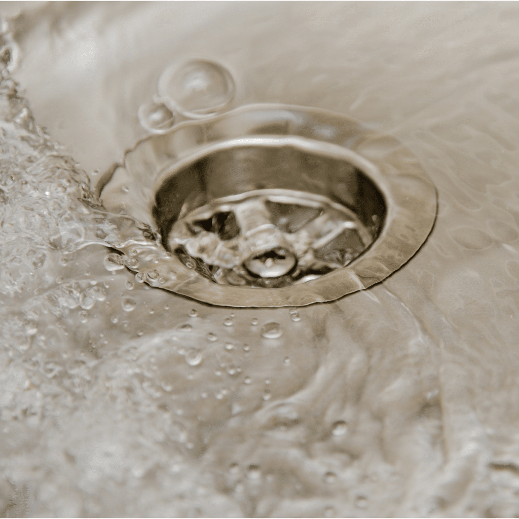 water draining in kitchen sink