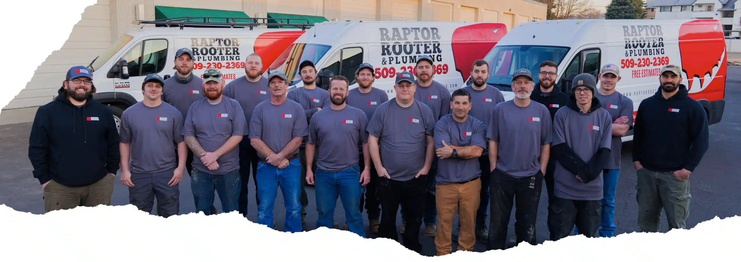 picture of Raptor Rooter & Plumbing team in front of company vehicles