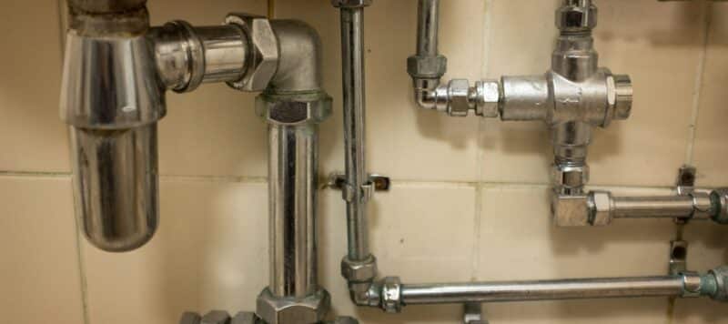 silver pipes in a home after a repiping job