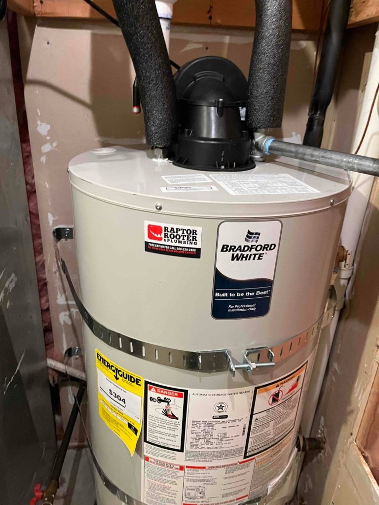 New Bradford White 50 gallon power vent gas water heater with new vent piping and drain pan installed in northeast Spokane, WA